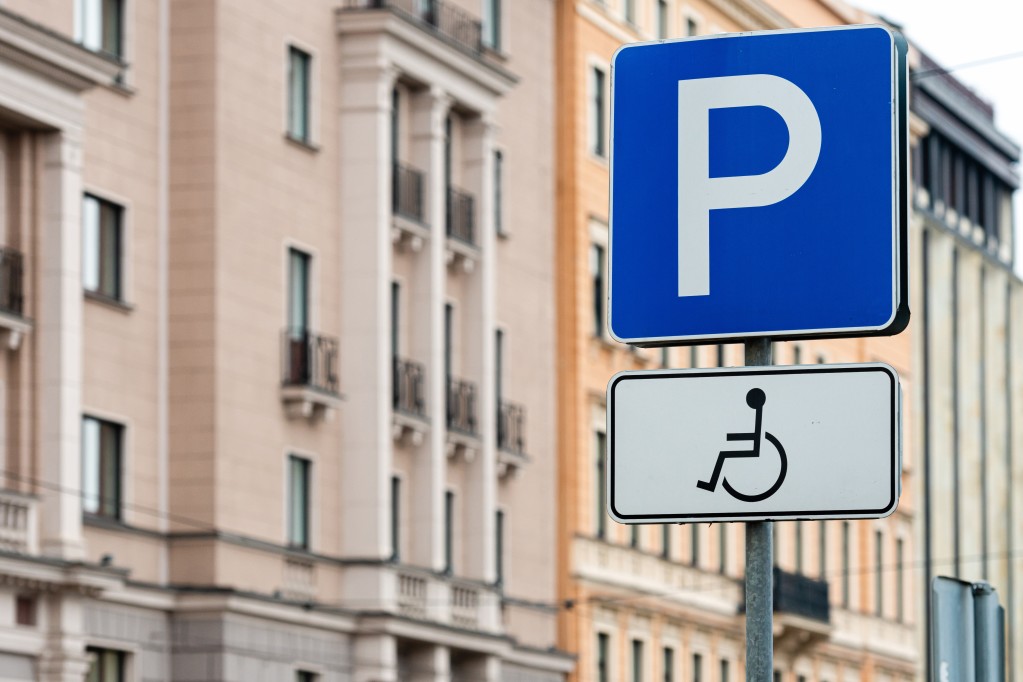 disabled-people-sign-for-parking-car-place-sign-blue-symbol-parking-background-road-traffic-car_t20_gL2YVx